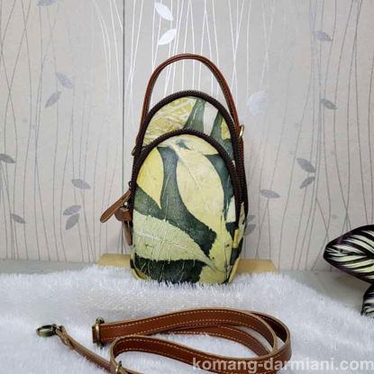 Picture of Small Leather sling-bag with green Botanical Print | Komang Darmiani